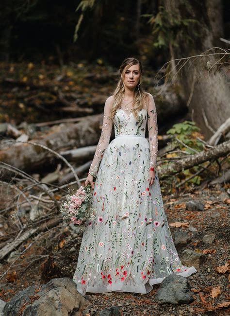 white dress with embroidered flowers.